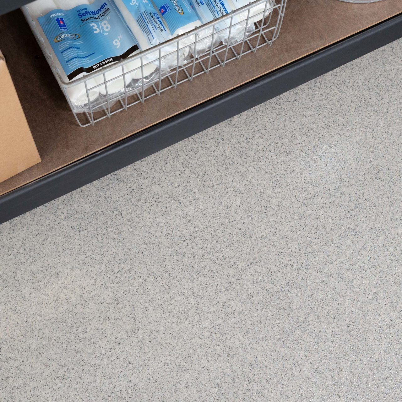 Neutral gray quartz floor coating in a storage area