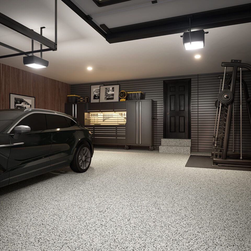 Modern garage with a light gray decorative flake floor coating